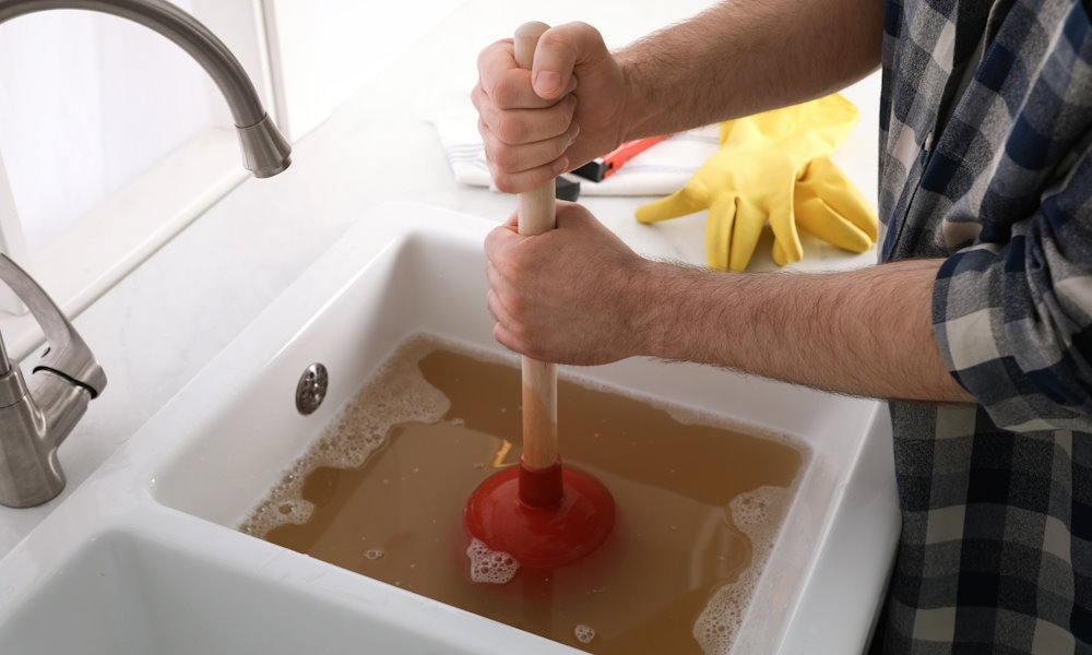 What are the Signs of a Clogged Drain in Need of Clearing?